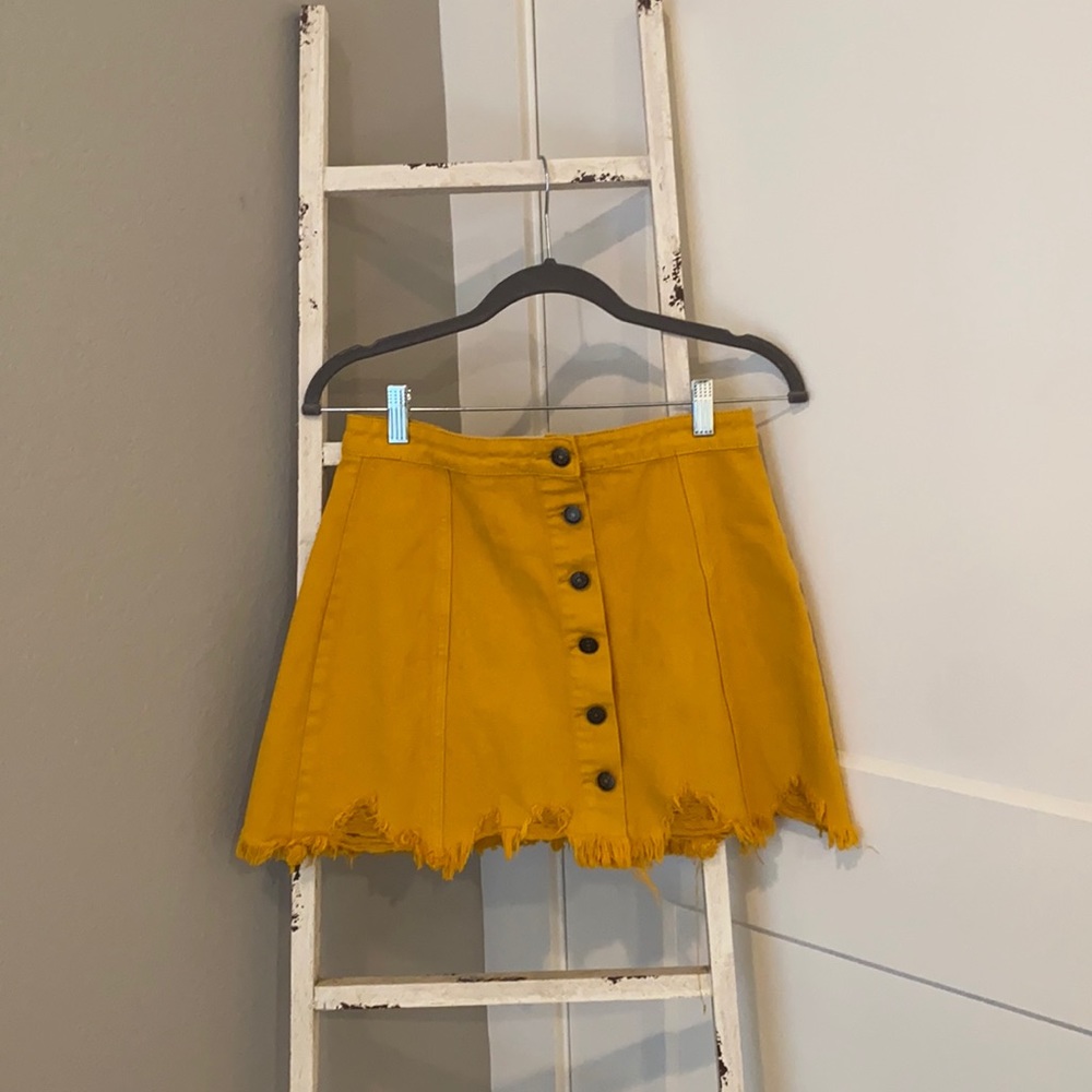gold mini skirt